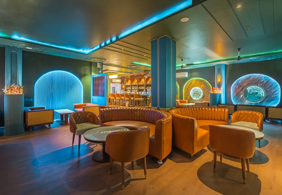 Evening ambience in the Jigyasa Palace bar with backlit arches