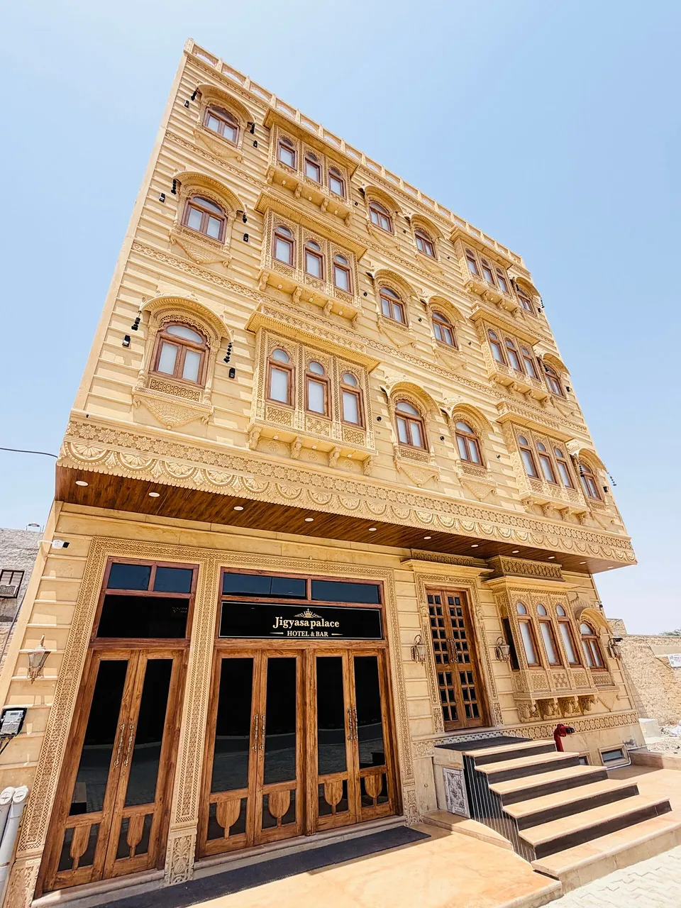 Carved sandstone exterior and entrance of Hotel Jigyasa Palace